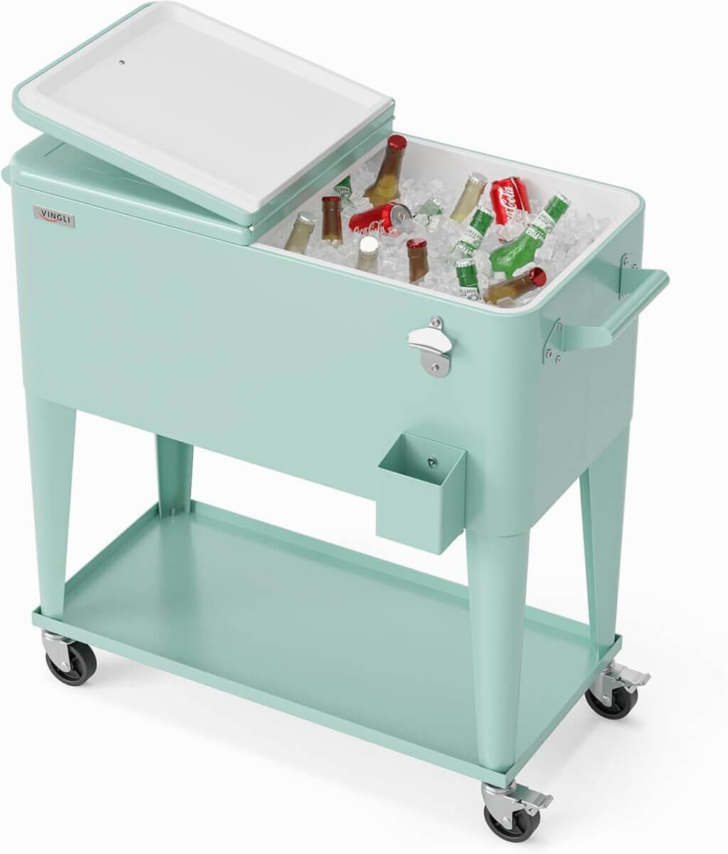 A light blue rolling cooler cart, an outdoor must-have with an open lid filled with ice, soda, and beer bottles, features a bottle opener and storage shelf underneath—perfect for all your entertaining essentials.