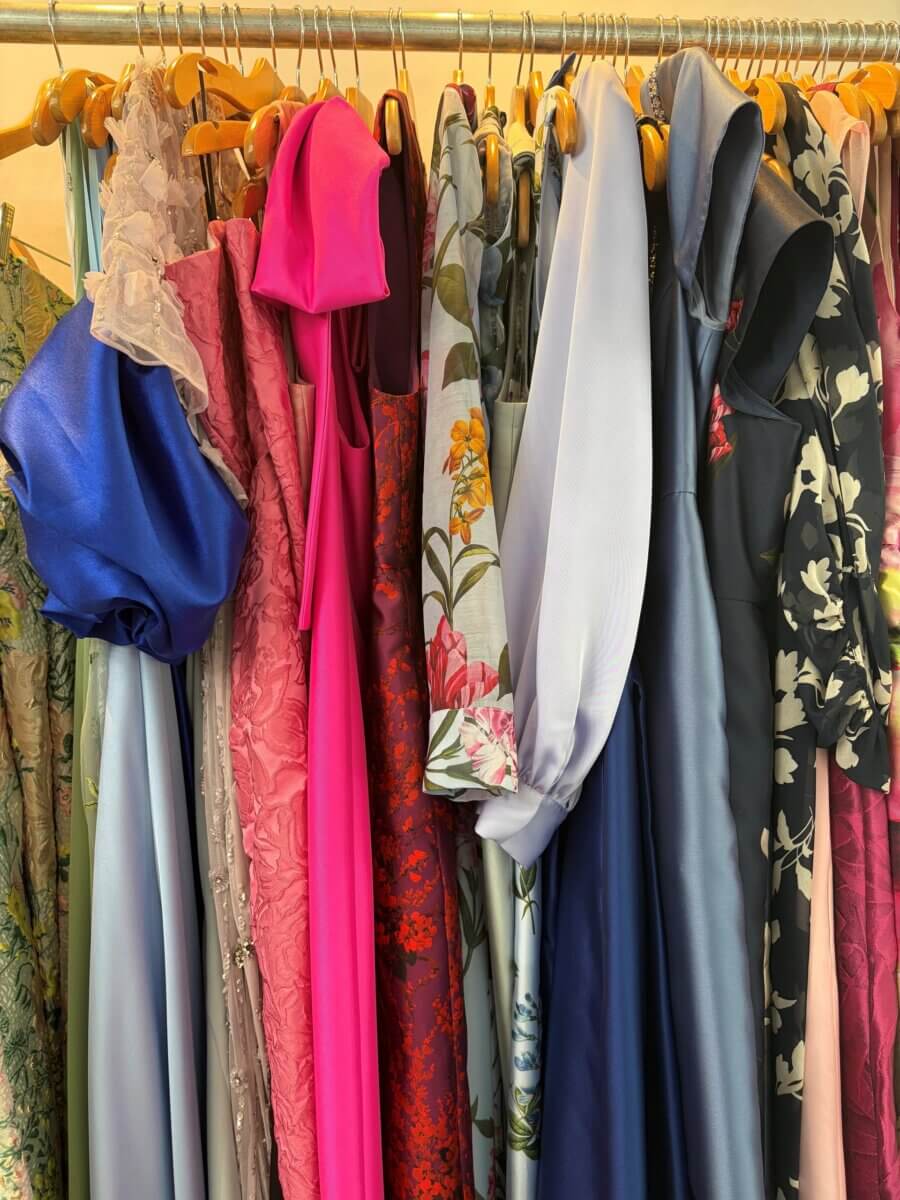 Nashville Steals, Deals & Announcements: June 2026 - 4 A collection of colorful bridesmaid dresses hanging on a rack.