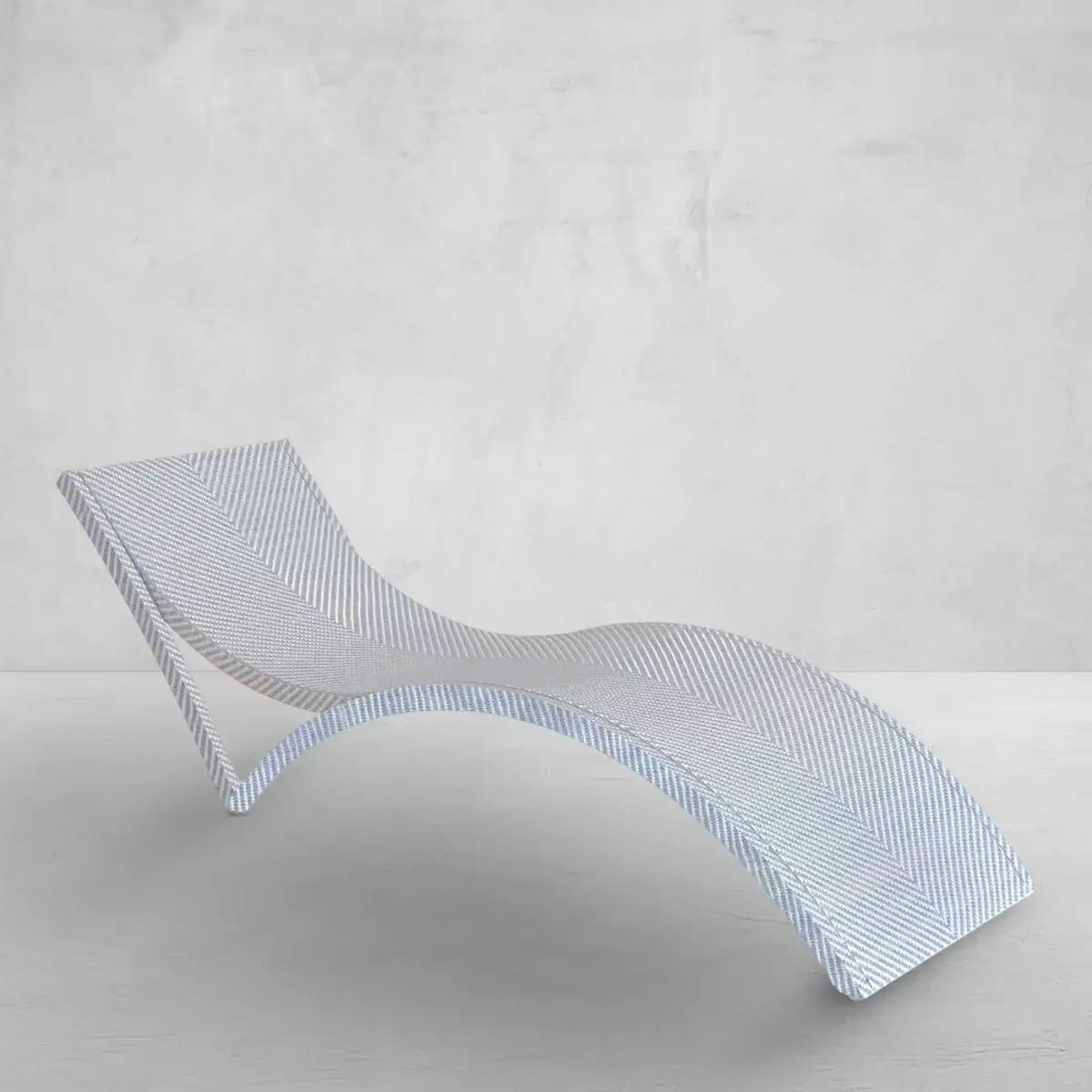 16 Luxe Louisville FINDS for July: Fine Art, Rare Bourbon & Resort-Ready Style - 16 Minimalist modern chaise lounge chair with a sleek, curved design and metallic finish, set against a plain light gray background.