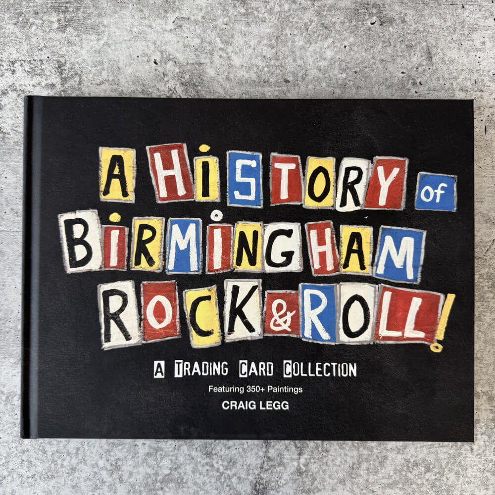 22 Birmingham FINDS for June: Breezy Dresses, Entertaining & Gifts for Dad - 19 A book titled "A History of Birmingham Rock & Roll: A Trading Card Collection" by Craig Legg, perfect for your summer shopping list, is shown on a gray textured surface.