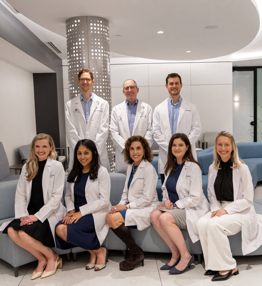 The team of board-certified dermatologists at Total Dermatology (from top left): Dr. Blake Phillips, Dr. James Krell, Dr. Andrew Fortugno, Dr. Callie Hill, Dr. Rajini Murthy, Dr. Melanie Appell, Dr. Michele Hill, and Dr. Stephanie Ives.