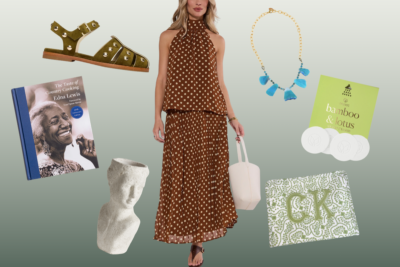 Woman in a brown polka dot halter dress surrounded by sandals, a necklace, a cookbook, and a vase.