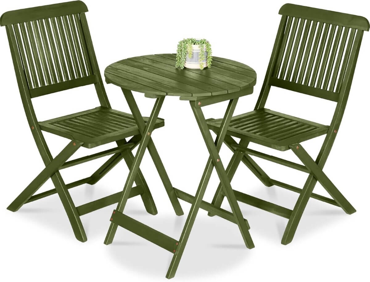 A green wooden bistro set with two slatted chairs and a round table, featuring a small potted plant in the center.