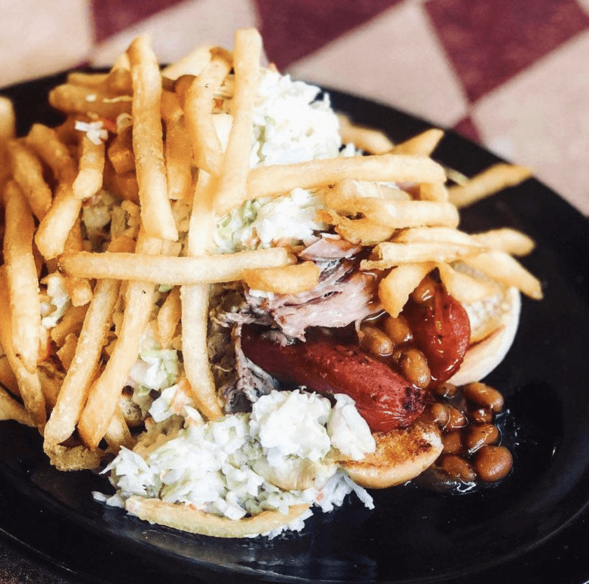 8 Memphis Hot Dogs That Go Way Beyond the Basics - 6 A hot dog smothered in brisket, baked beans, coleslaw, and French fries.