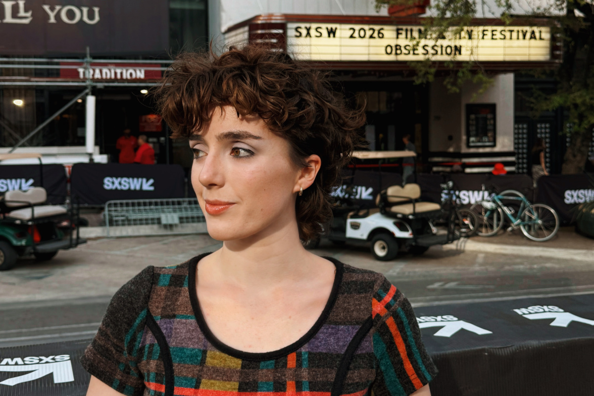 A Memphian with short curly hair stands outside a venue, framed by a "SXSW 2026 Film & TV Festival Obsession" marquee sign in the background.