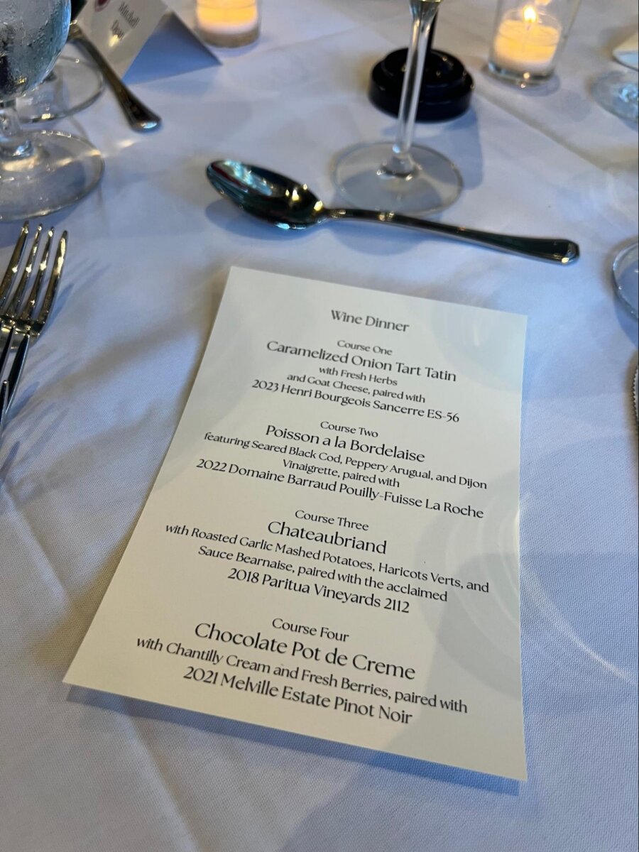 A menu for a wine dinner, sitting on a 