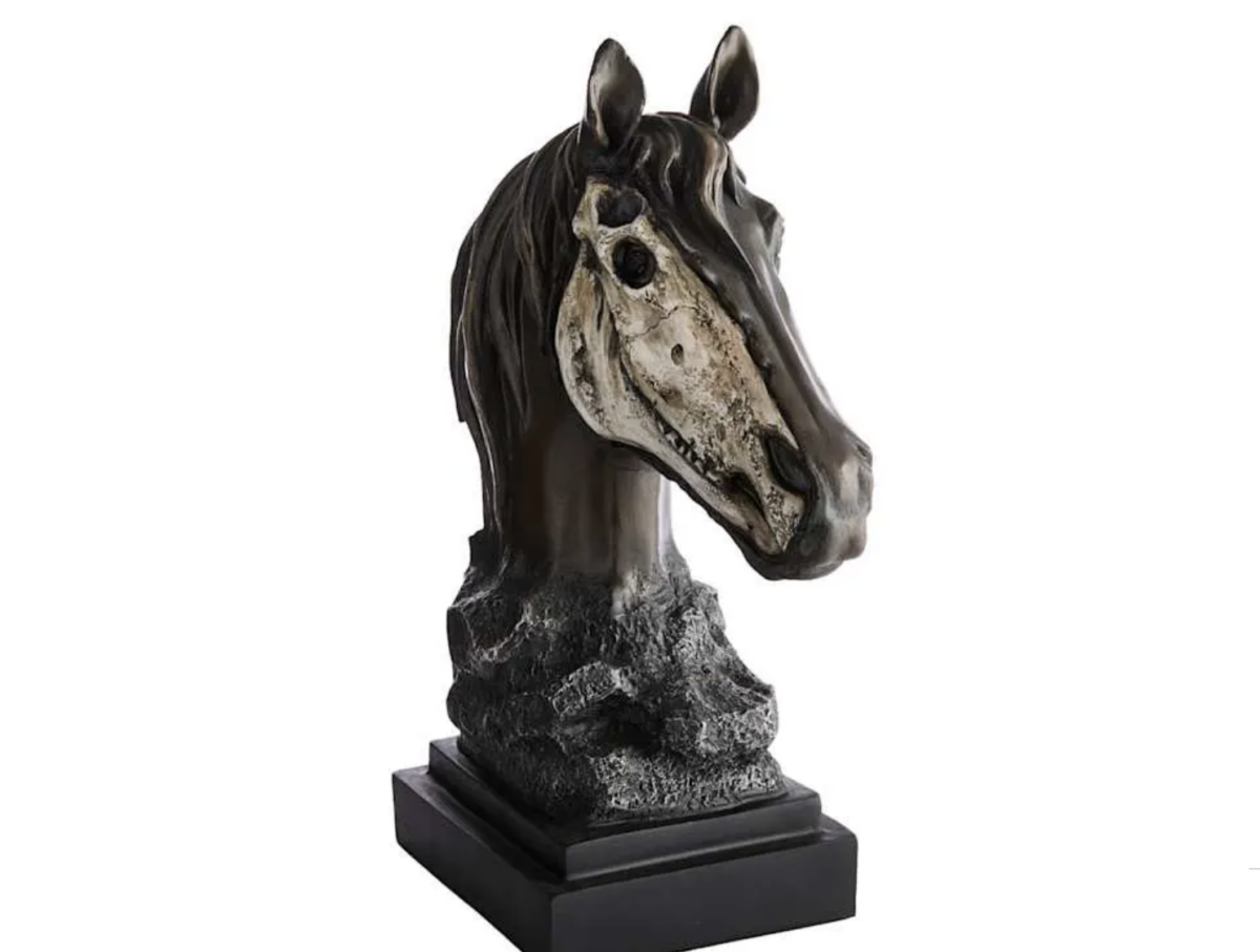 20 Halloween Decor FINDS That Are Actually Chic - 7 A sculpture of a horse’s head with one side showing realistic features and the other side depicting a skeletal structure, mounted on a textured base—perfect as striking Halloween decor for the spooky season.