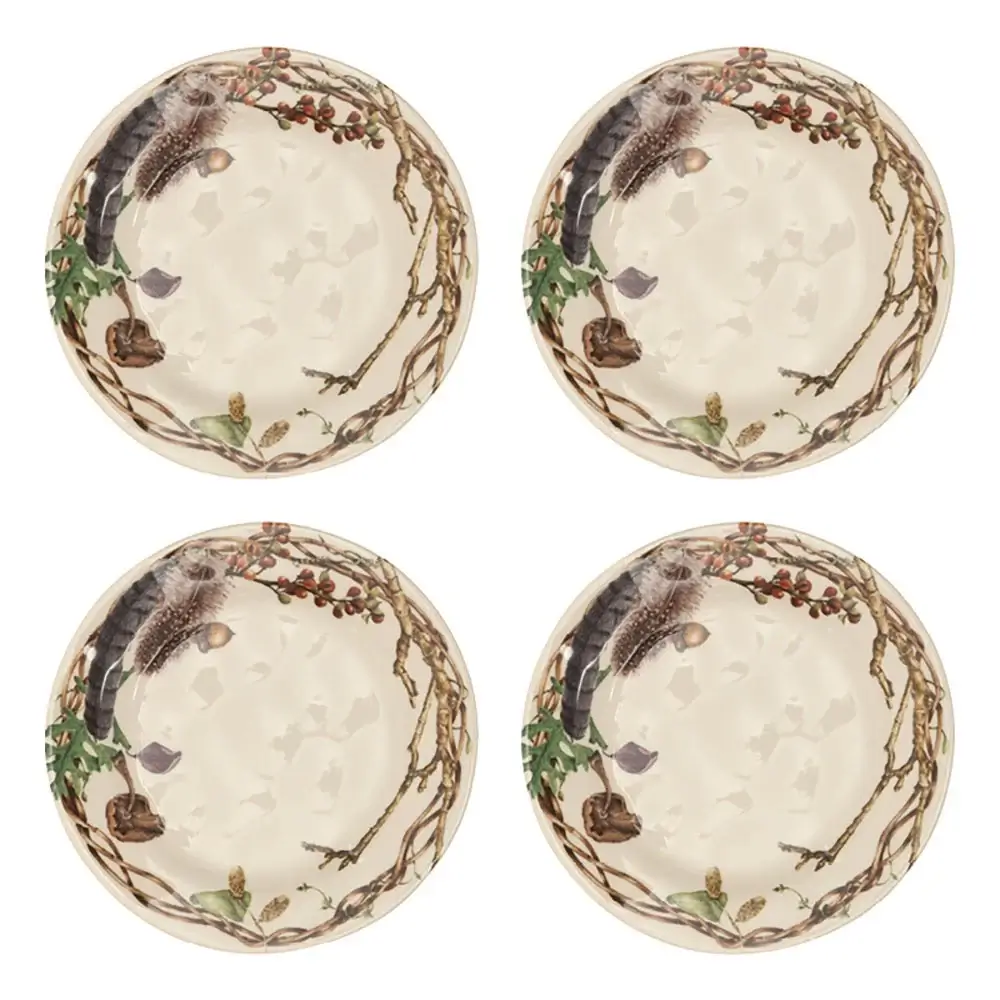 Four round ceramic plates with branch, berry, and pinecone designs along the rim, arranged in a grid pattern on a white background—perfect for your September Nashville FINDS.