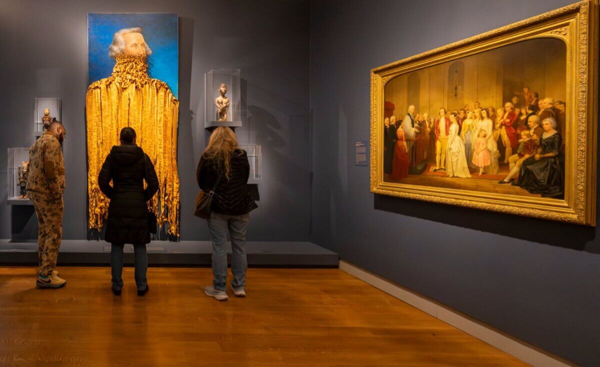 7 Southern Art Museums & Installations Worth Planning a Trip Around - 5 Three people view artwork at the Virginia Museum of Fine Arts.