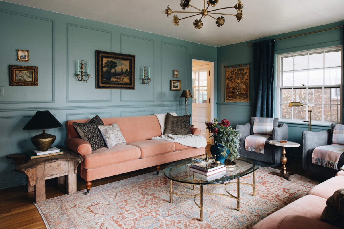 From ICU Nurse to Interior Designer: Meet Gretchen Rose of Kentucky Rose Designs - 17 A cozy living room with baby blue walls and a coral couch.