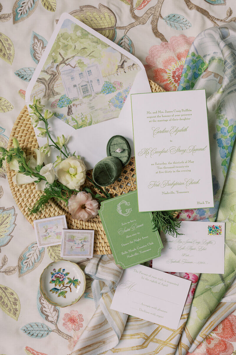 A Secret Speakeasy and Late-Night Taco Bell?! This Nashville Wedding Had Serious Surprises - 7 Wedding invitation suite with green lettering on white cardstock, a matching dinner invitation, a reply card, a watercolor envelope, and a diamond ring in a velvet box for a Nashville garden-party wedding.